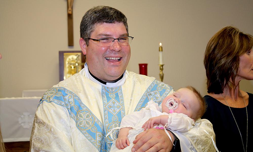 First Baptism - Father Chenault