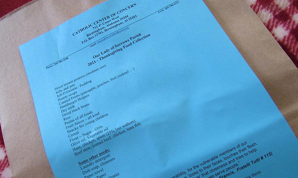 Parishioners Fill Bags for Catholic Center of Concern